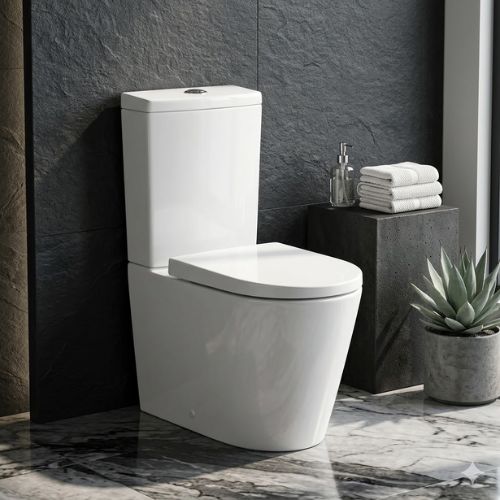 Modern Urby WC in brilliant white ceramic, featuring a sleek skirted design and soft-close seat, set in a contemporary bathroom with dark slate walls and a marble floor.