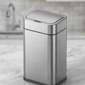 A high-capacity stainless steel smart sensor bin with a touchless lid, set against a modern, blurred kitchen background.
