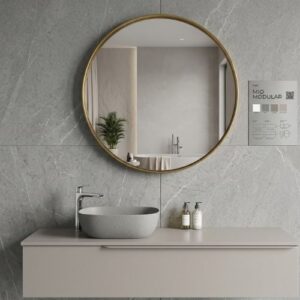 A modern, minimalist wall-mounted bathroom vanity featuring a stone vessel sink, a large circular mirror, and a sophisticated gray textured wall background.