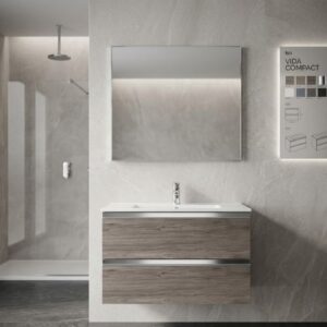 A modern, wall-mounted Vida Compact 80 bathroom vanity featuring a rich wood-grain finish, sleek integrated basin, and matching mirror, set in an elegant, contemporary bathroom space.