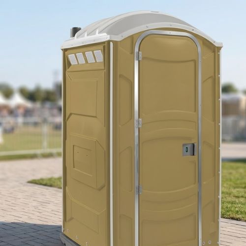 A premium, durable portable restroom unit for industrial and commercial use in a clean, outdoor setting.